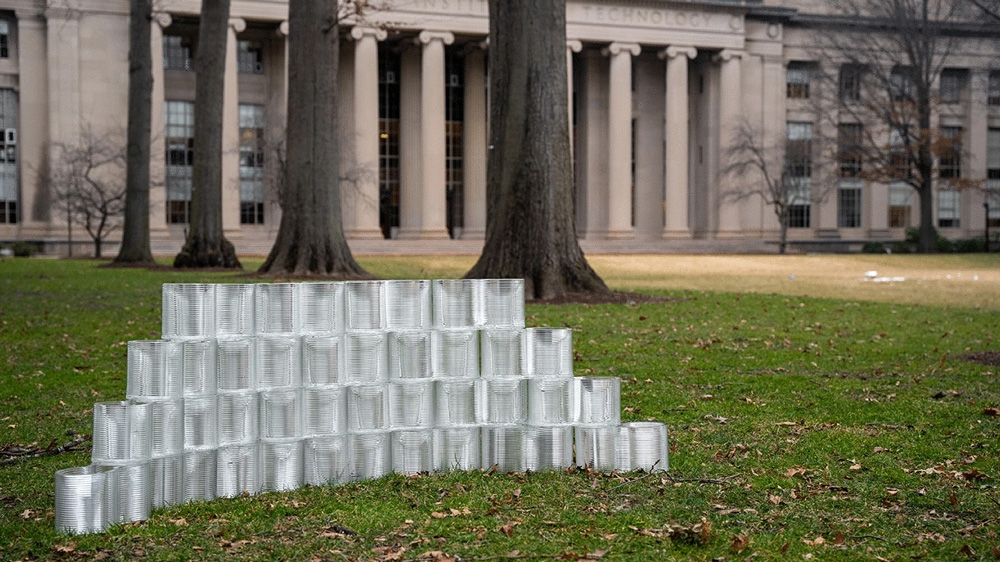 In the middle of Killian Court, a stout pyramid of the glass bricks is 4 layers tall, and looks about 15 feet across and 4 feet high.