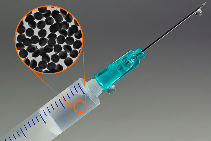 syringe with inset showing antibodies