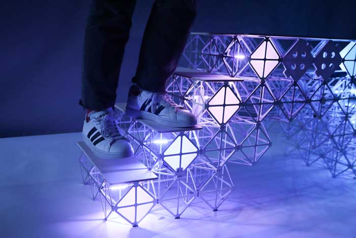 person stands on stairs made of modular materials