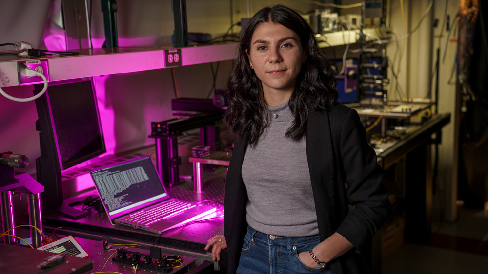 Sabrina Corsetti in lab with pink lighting