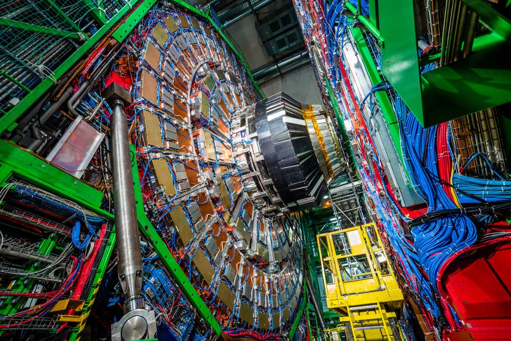The gigantic Large Hadron Collider is disc-shaped and filled with wires